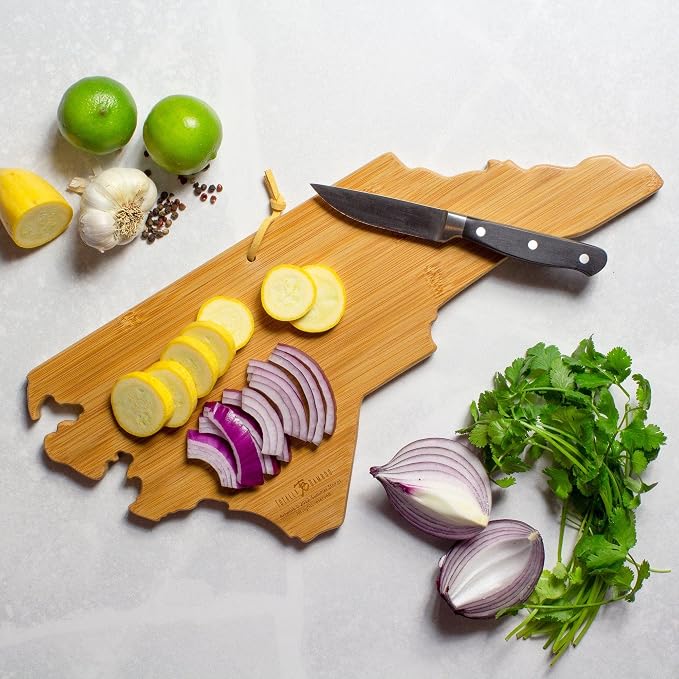 Totally Bamboo North Carolina State Shaped Cutting Board, Summer Stokes Art | State charcuterie board with colorful hand-drawn landscape art. Smooth reverse side for food prep. Hang tie for wall display.