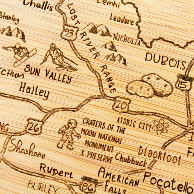 Totally Bamboo A Slice of Life Idaho Engraved Map Cutting Board | 11” x 8.75” charcuterie board with engraved state map artwork. Smooth reverse side for food prep. Hang tie for wall display.