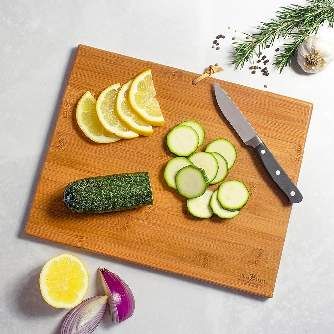 Totally Bamboo Wyoming State Shaped Cutting Board, Summer Stokes Art | State charcuterie board with colorful hand-drawn landscape art. Smooth reverse side for food prep. Hang tie for wall display.