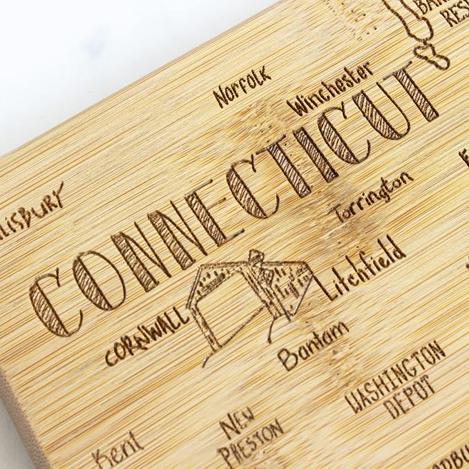 Totally Bamboo Destination Connecticut State Shaped Cutting Board | State charcuterie serving board with engraved map artwork. Smooth reverse side for food prep. Hang tie for wall display.