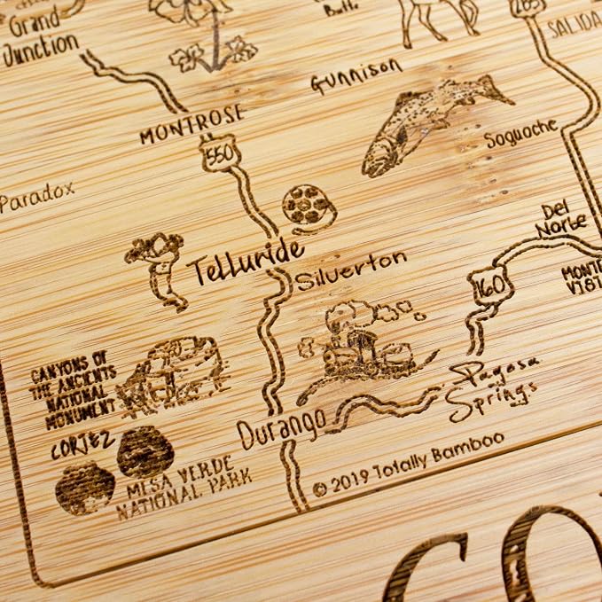 Totally Bamboo A Slice of Life Colorado Engraved Map Cutting Board | 11” x 8.75” charcuterie board with engraved state map artwork. Smooth reverse side for food prep. Hang tie for wall display.