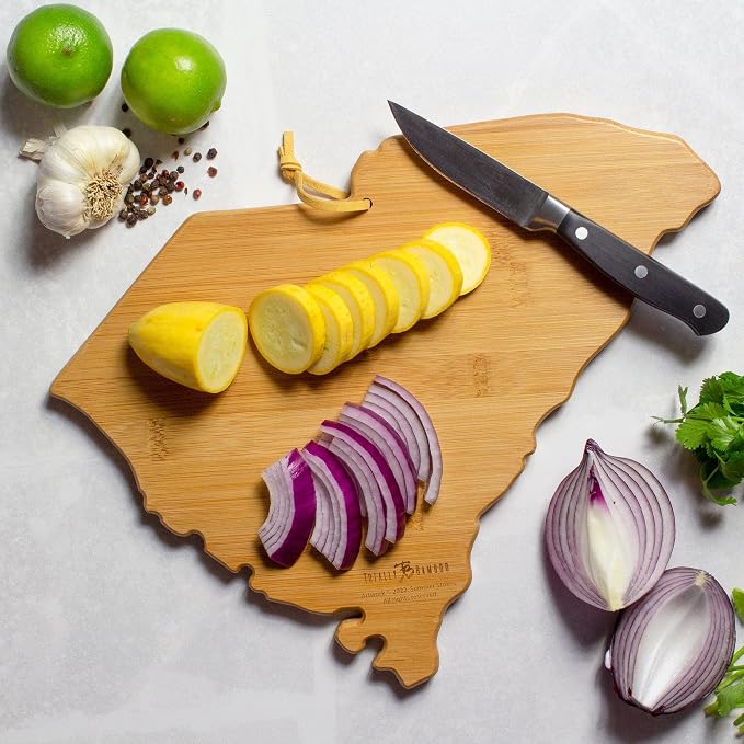Totally Bamboo South Carolina State Shaped Cutting Board, Summer Stokes Art | State charcuterie board with colorful hand-drawn landscape art. Smooth reverse side for food prep. Hang tie for wall display.