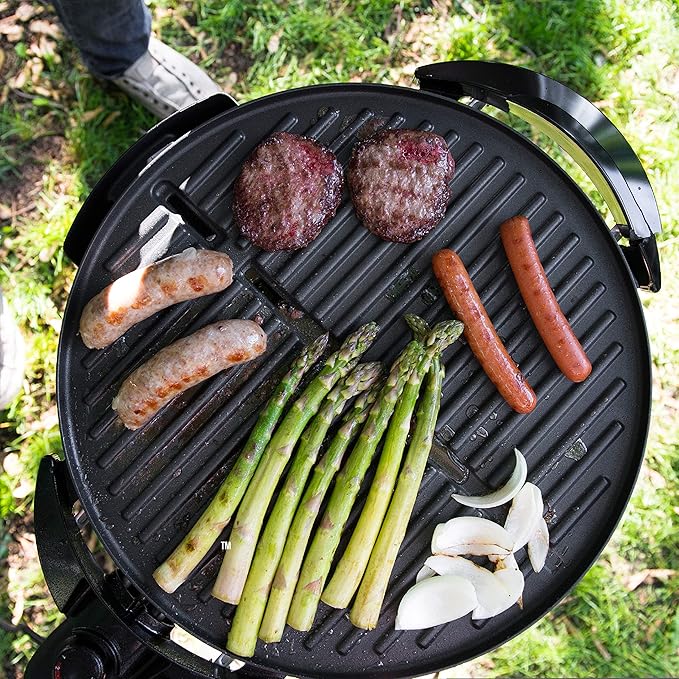 George Foreman Indoor/Outdoor Electric Grill with Stand, 15-Serving | 15-serving electric grill with removable stand, 5 heat settings and fat-removing slope for healthier grilling.